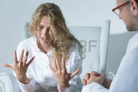 A doctor with a distraught patient